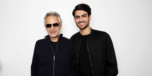 In this Oct. 26, 2018 photo, Andrea Bocelli and his son Matteo Bocelli pose for a portrait in New York to promote the album "Si," a collection of duets, including their father and son song, "Fall On Me."