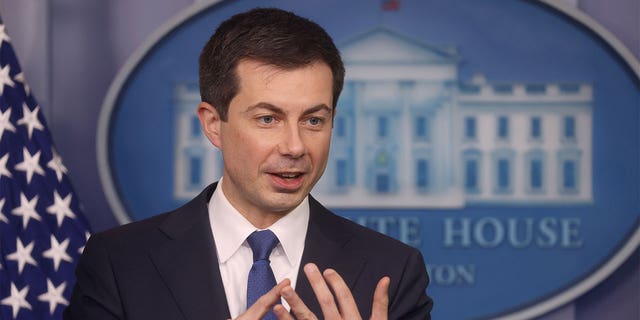 U.S. Secretary of Transportation Pete Buttigieg speaks to the news media during a press briefing at the White House in Washington, D.C., Nov. 8, 2021.