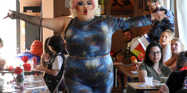 This July 28, 2022, photo shows drag queen Dela Rose performing in a mock election at Cafecito Bonito in Anchorage, Alaska where, people ranked the performances by drag performers.
