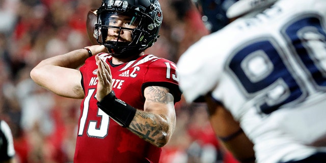 North Carolina State's Devin Leary passes during the first half against Connecticut in Raleigh, North Carolina, on Sept. 24, 2022.