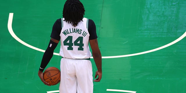 Robert Williams III of the Boston Celtics prepares to shoot a free throw against the Golden State Warriors during the first quarter in Game 6 of the 2022 NBA Finals at TD Garden June 16, 2022, in Boston.