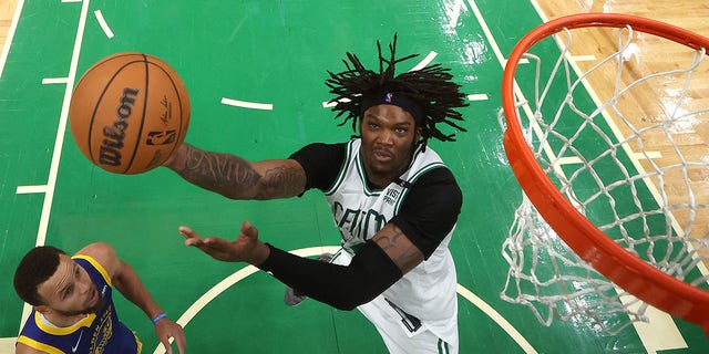 Robert Williams III of the Boston Celtics shoots against the Golden State Warriors in Game 6 of the 2022 NBA Finals at TD Garden June 16, 2022, in Boston.