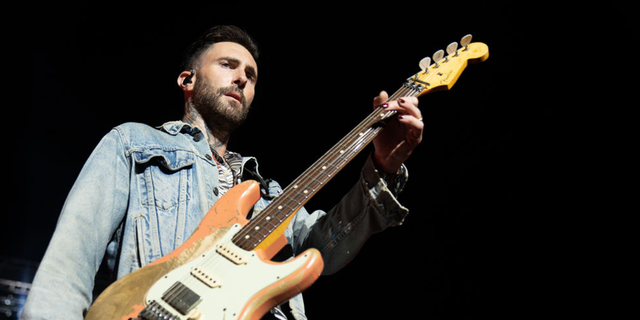 (file photo) Adam Levine denied having an affair but admitted Monday to "crossing a line" in his marriage.