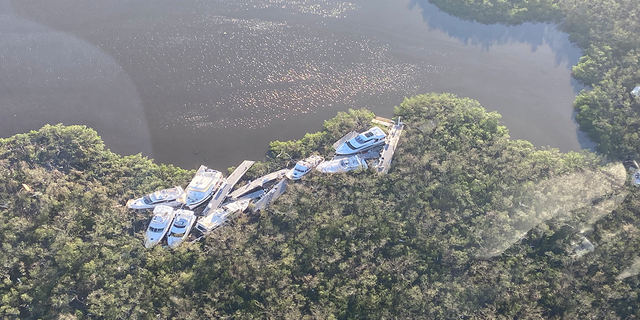 Boats piled up in mangroves in Fort Myers after Hurricane Ian destroyed most of the coastline.