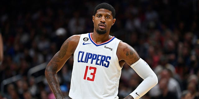 Paul George of the Los Angeles Clippers looks on during the first half of a preseason game against the Portland Trail Blazers at Climate Pledge Arena Oct. 3, 2022 in Seattle. The Clippers won 102-97.
