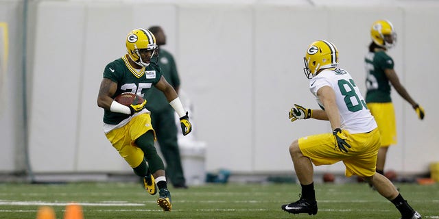 Antonio Dennard #35 of the Green Bay Packers runs through drills during rookie mini camp at Don Hudson Center on May 16, 2014 in Green Bay, Wisconsin.