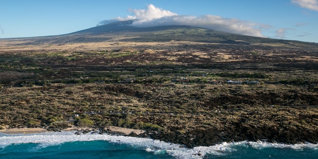 A nearly deserted beach at the edge on an old Mauna Loa lava flow is viewed on Dec. 16, 2016, in this aerial photo taken along the Kona Kohala Coast, Hawaii.