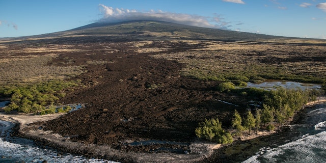 A deserted beach at the edge on an old Mauna Loa lava flow is viewed on Dec. 16, 2016, in this aerial photo taken along the Kona Kohala Coast, Hawaii.