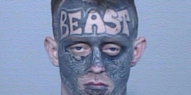 Jaimes Sutton remained a fugitive in New South Wales for two weeks despite his distinctive face tattoo.
