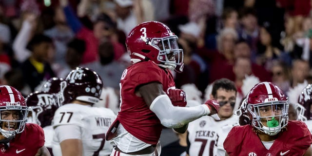 Alabama defensive back Terrion Arnold (3) celebrates his interception during the first half of the team's NCAA college football game against Texas A&M, Saturday, Oct. 8, 2022, in Tuscaloosa, Ala.
